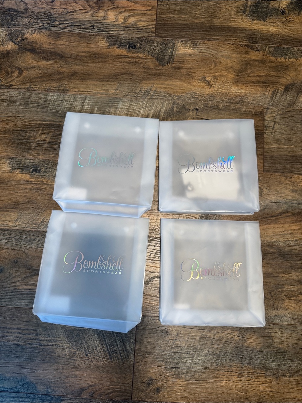 Bombshell Sportswear Frosted White Holographic Logo Packaging Bags - Set of 4